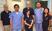 Dr. Elwood MacMullin, Dr. Rex Dunn, and Guatemalan interns